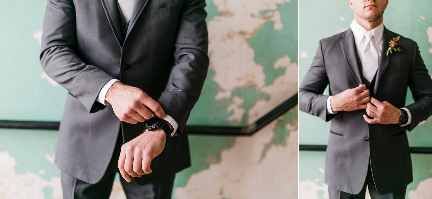 groom details buttoning jacket and adjusting cuffs