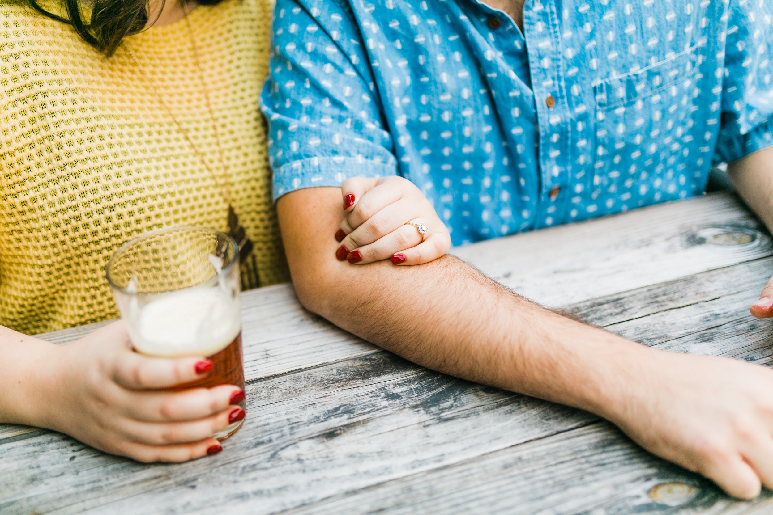 couple with beer engagement session
