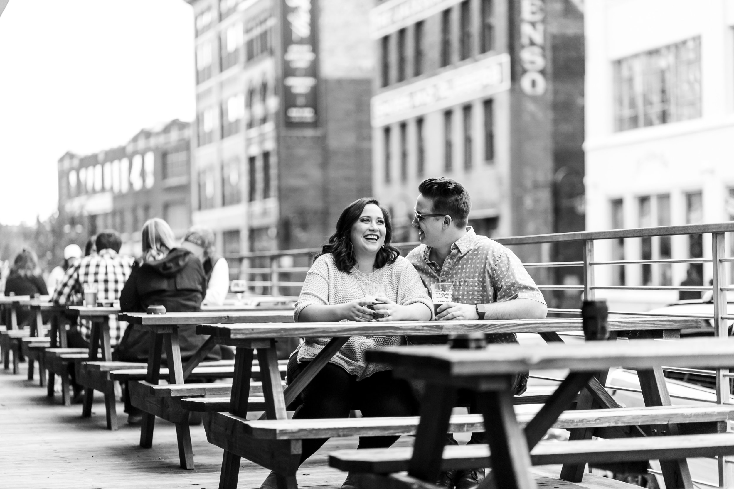 black and white old city downtown knoxville couple engagement session drinking pour taproom