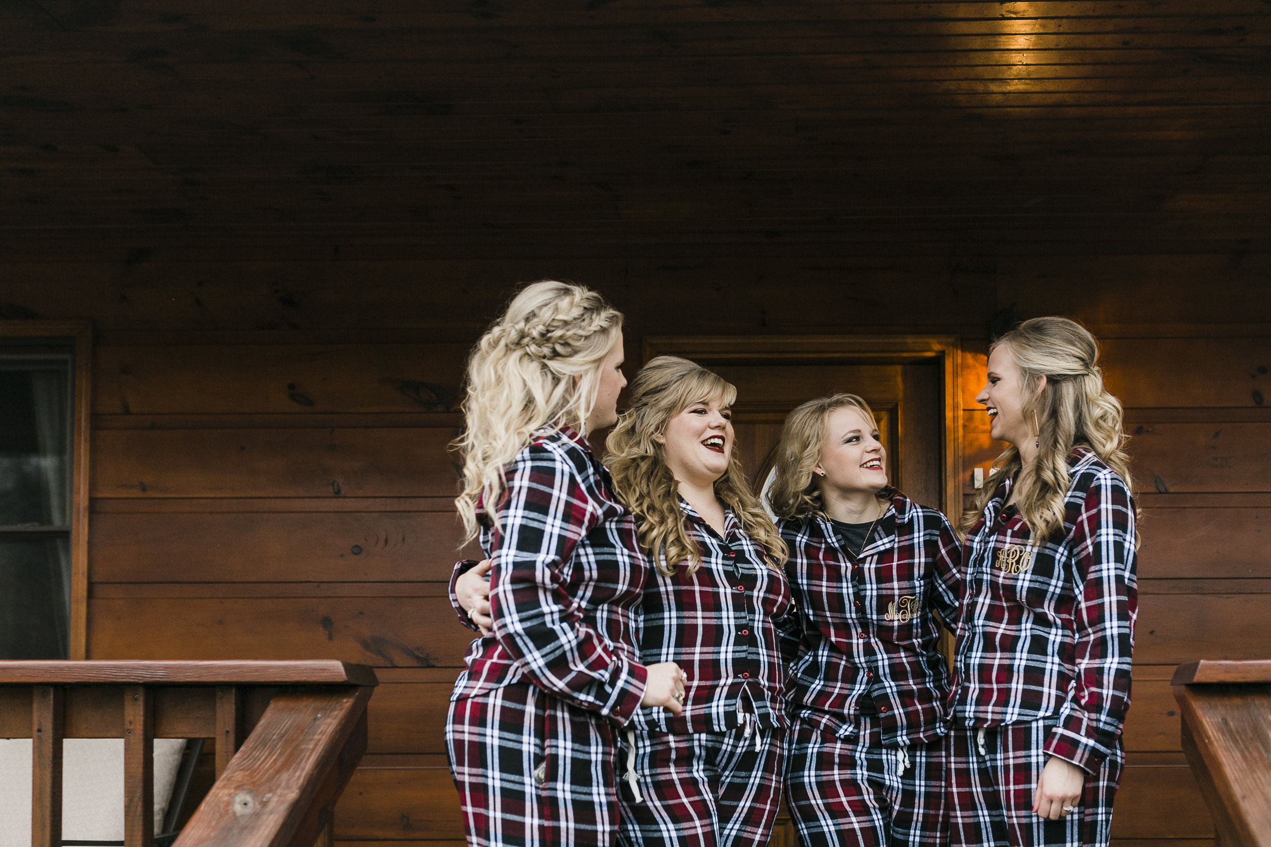 bridesmaids in flannel pajamas at berry spring lodge