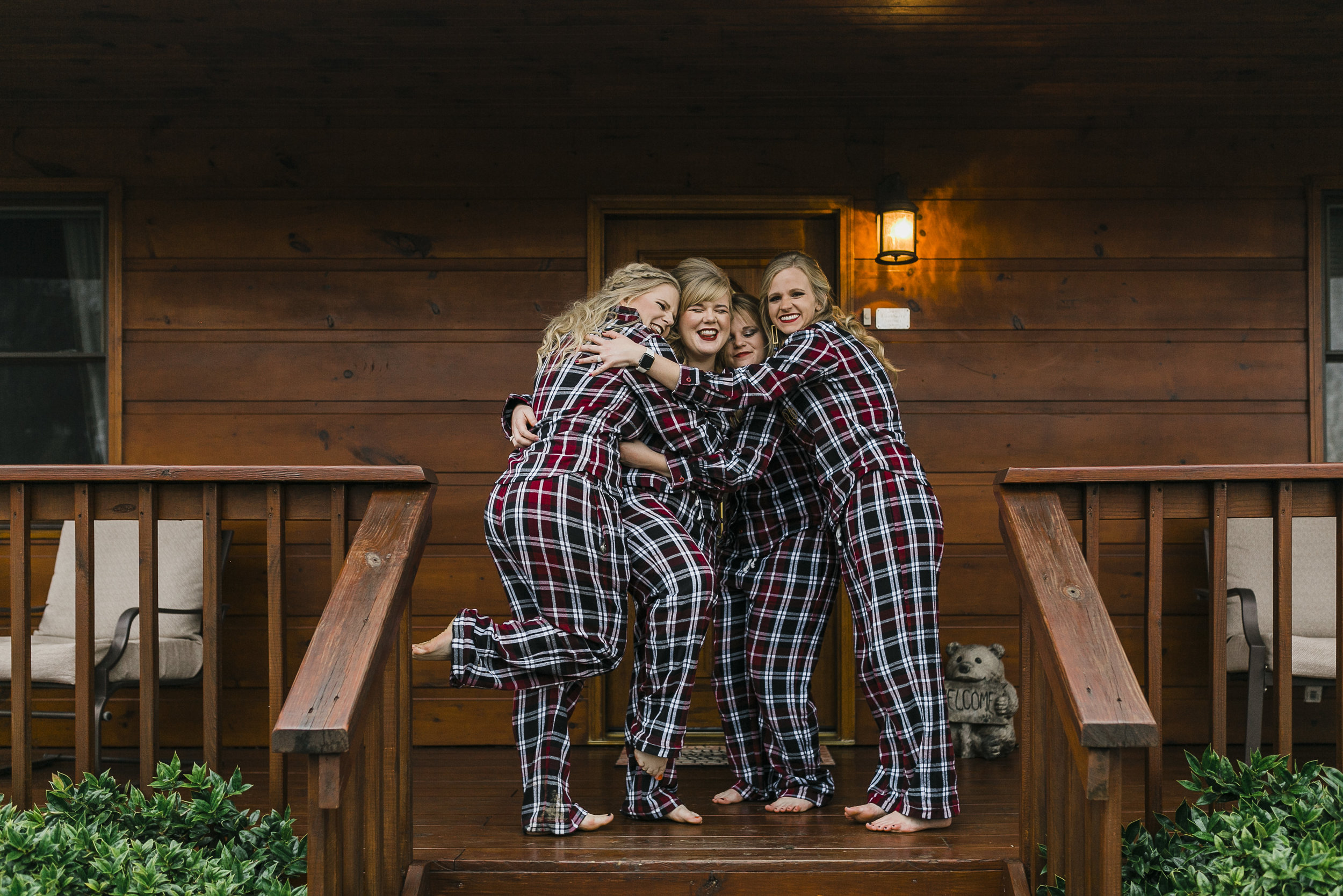 blonde bridesmaids in flannel pajamas at berry spring lodge