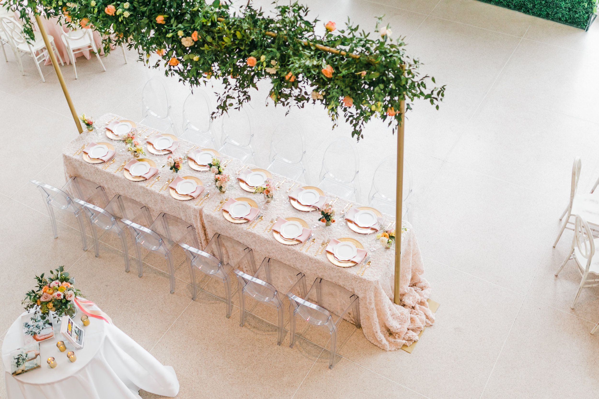 statement head table at the knoxville museum of art greenery and pink