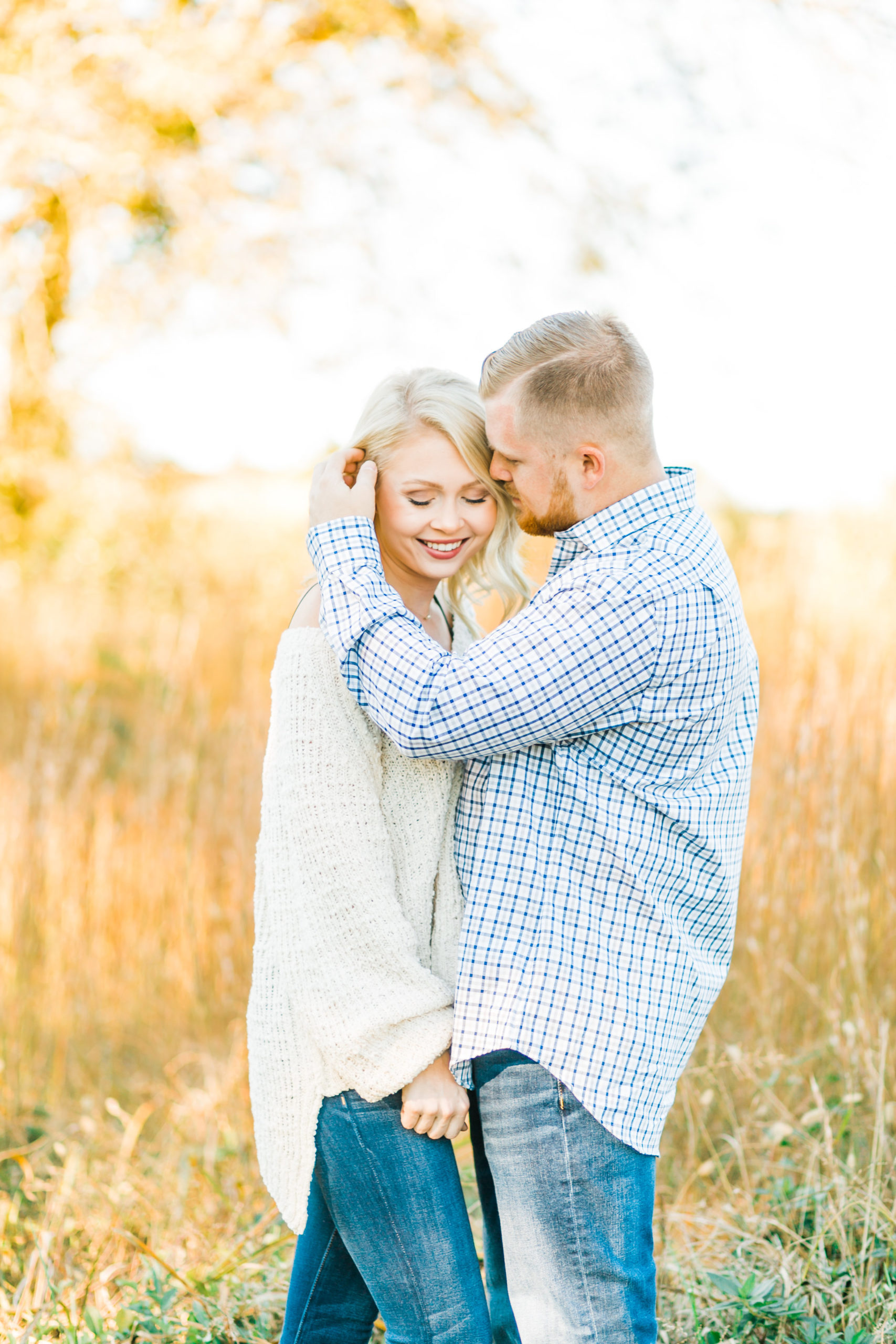 young blonde stylish couple golden hour engagement knoxville melton hill park