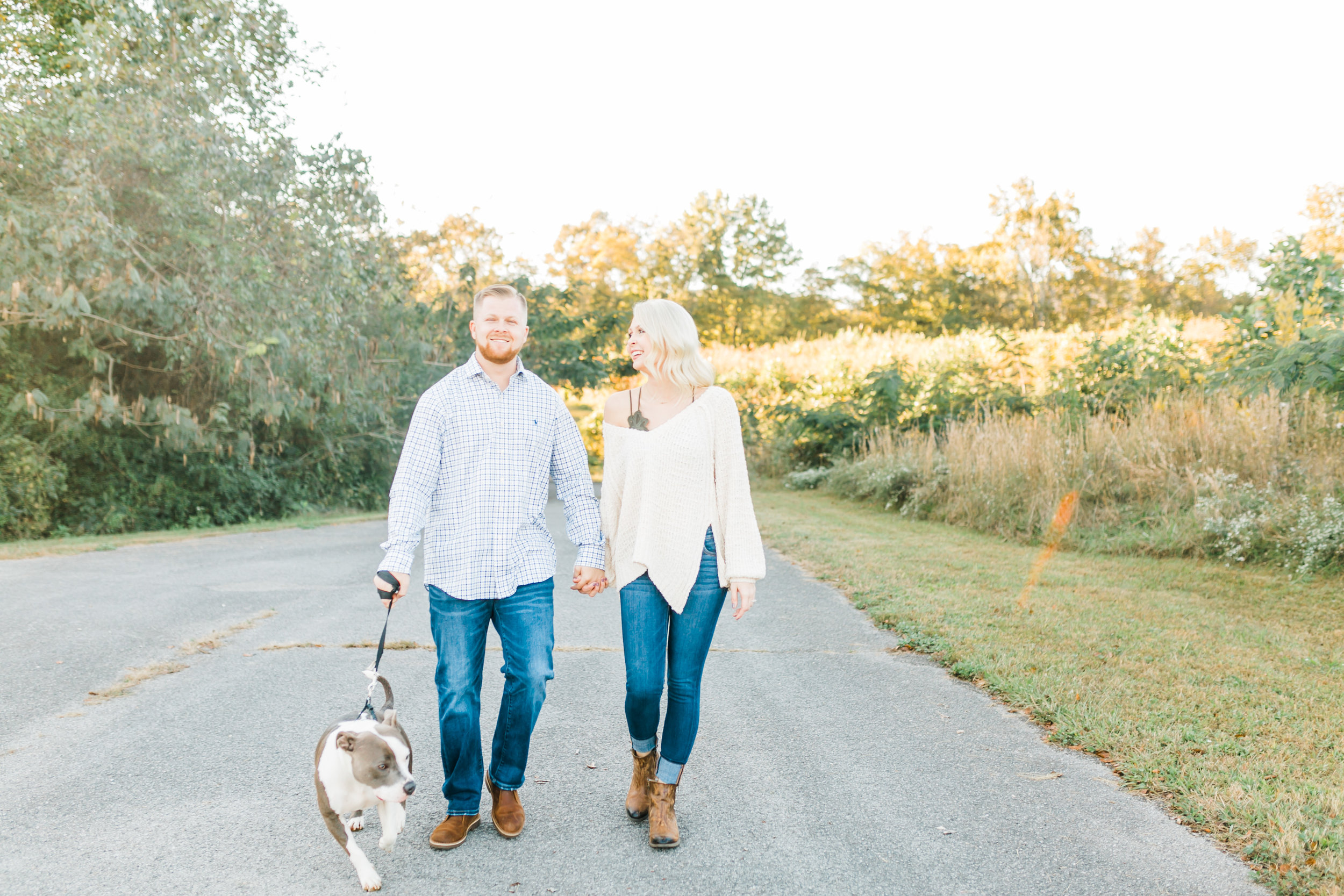 couple walking with pitbull knoxville tn melton hill park engagement