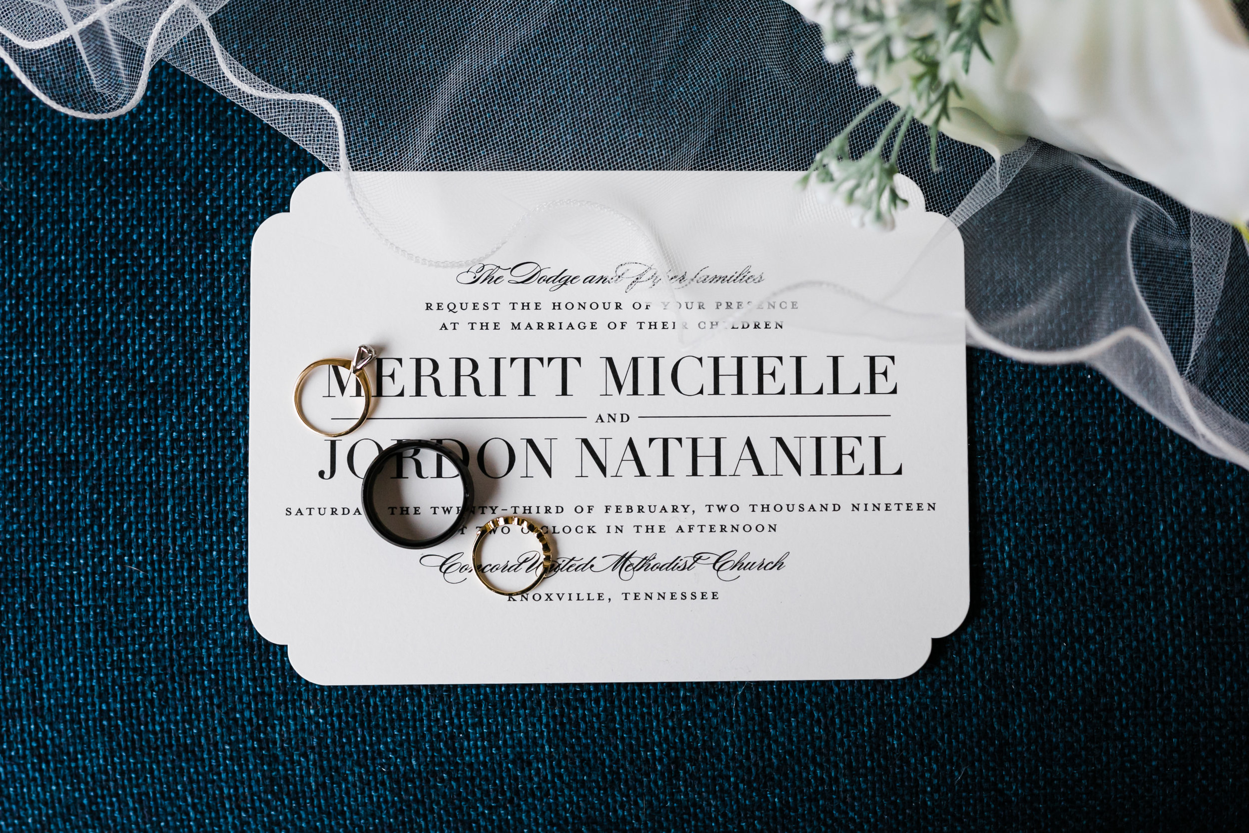 classic invitation suite styled with rings and veil