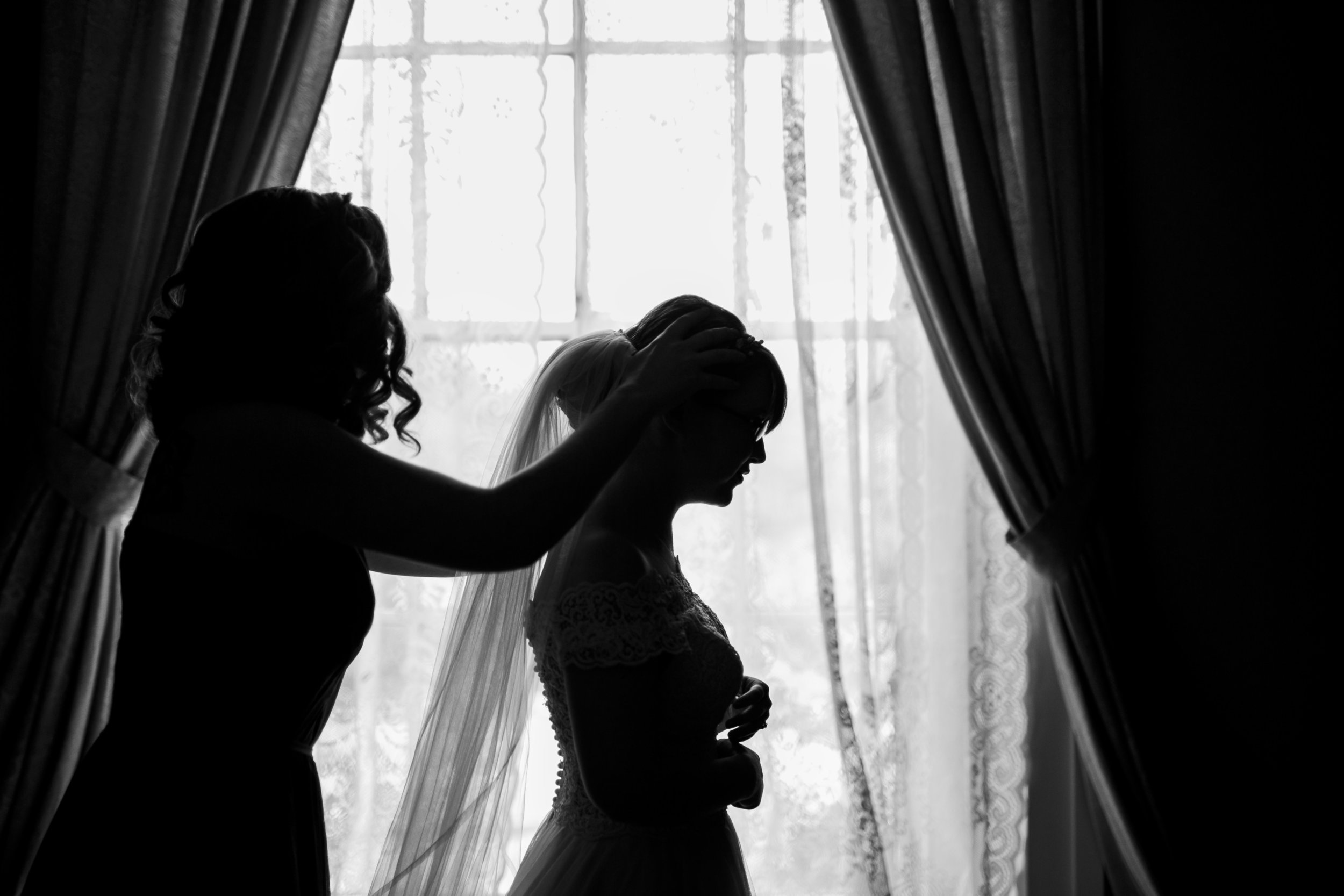 silhouette of bride in window at bleak house