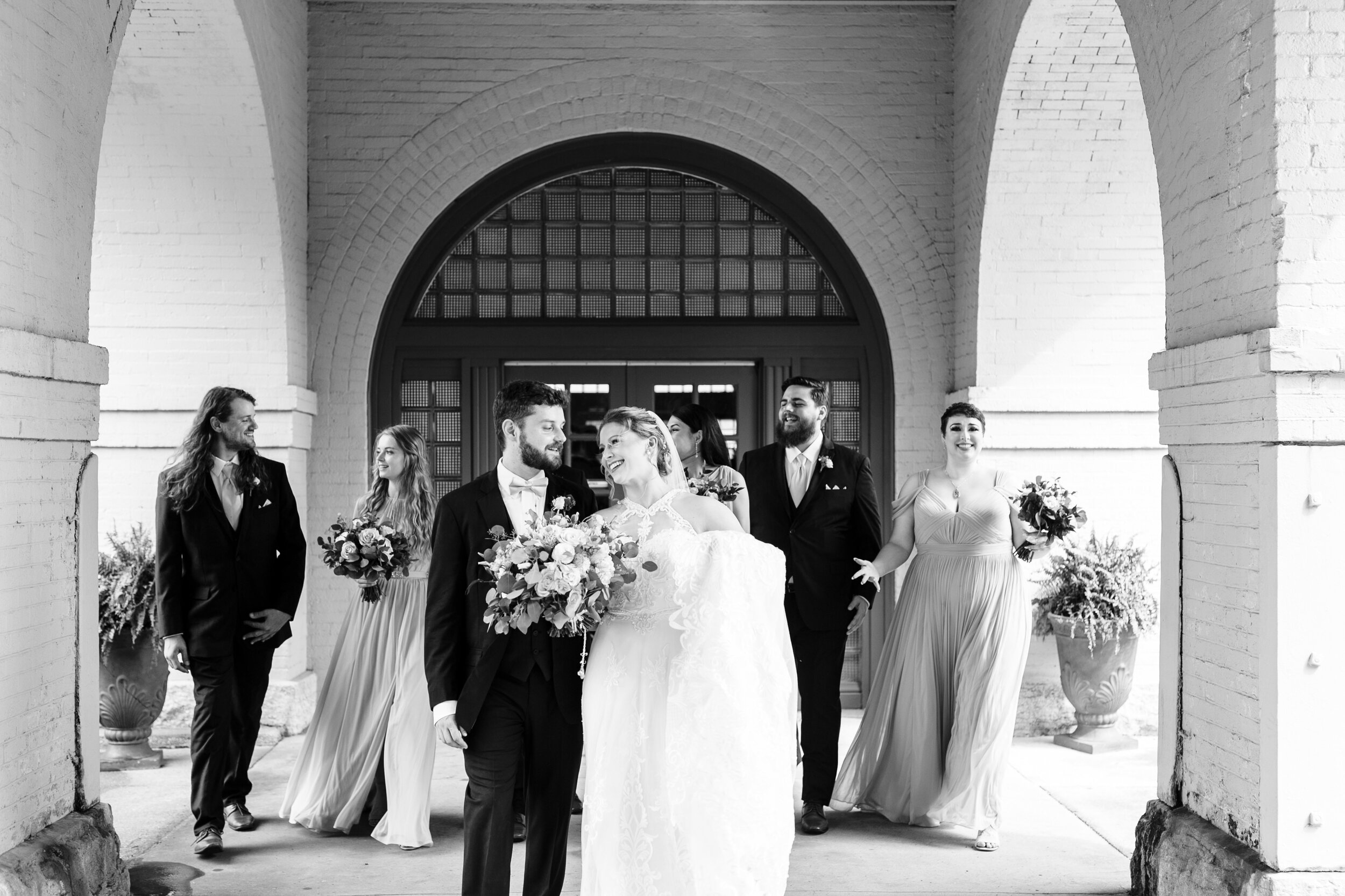 black and white wedding party at the historic southern railway