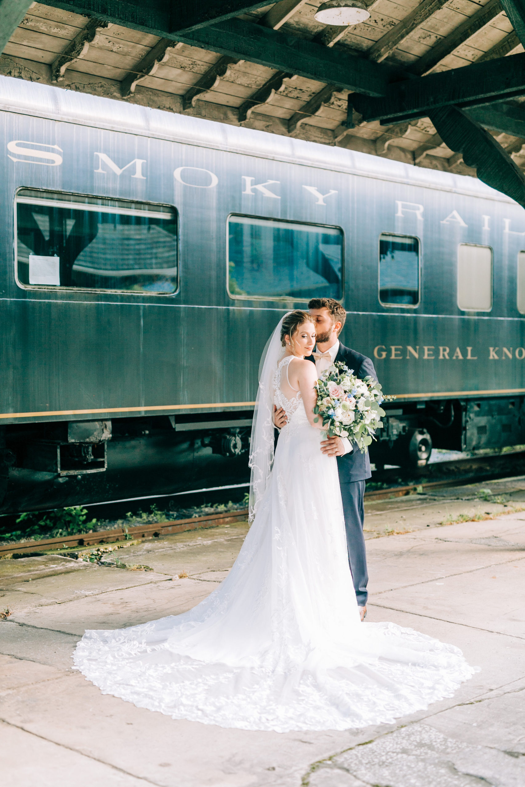 bride and groom at train car historic southern railway